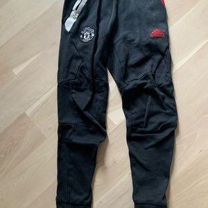 Black Adidas men’s sweatpants.